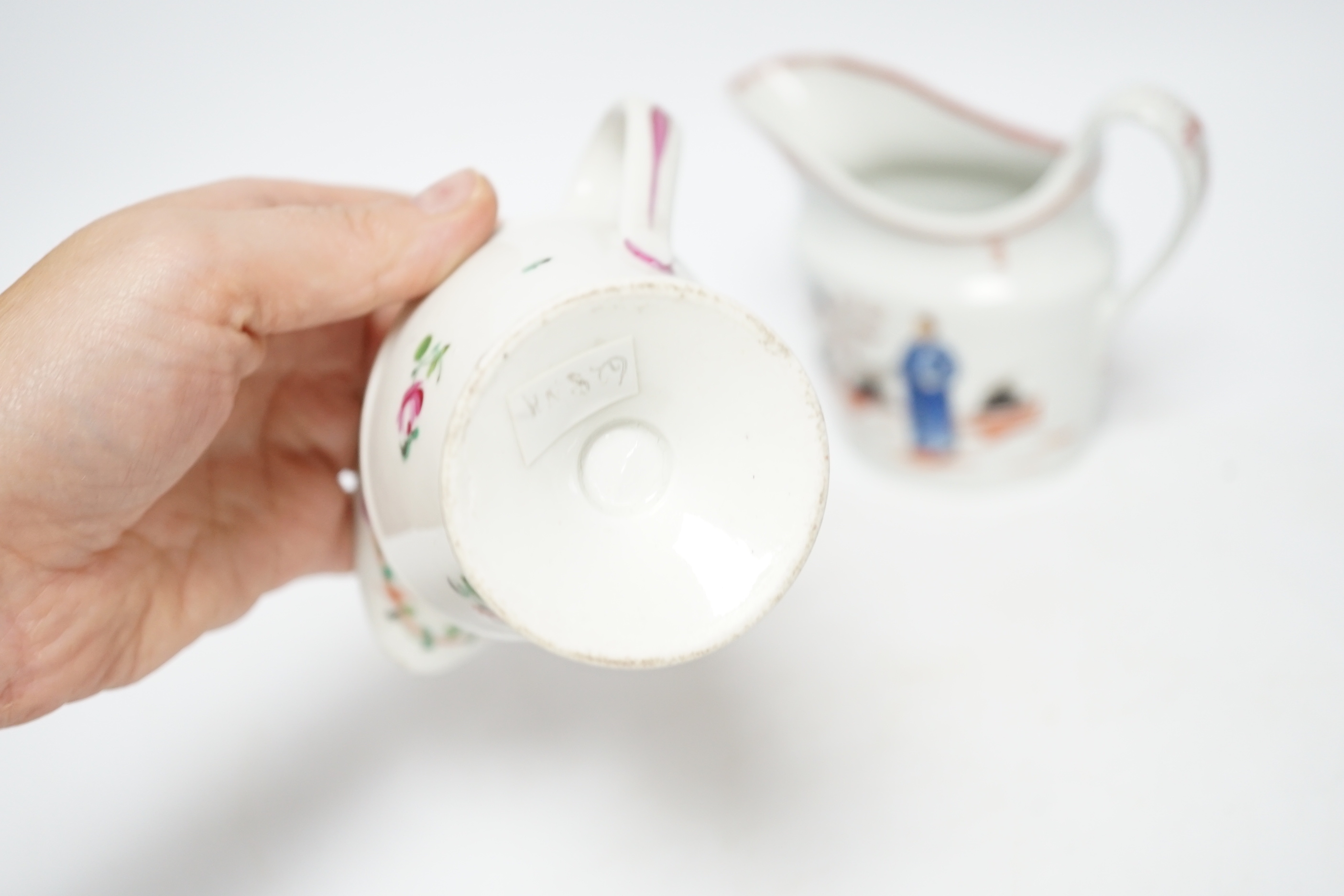 An 18th century Newhall teapot stand and a New Hall milk jug, c.1810 and a Keeley milk jug